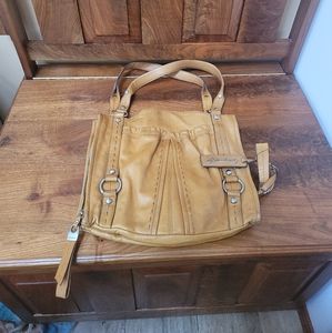B. Makowsky Tan Leather Bag.
